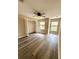 Bedroom featuring a ceiling fan, two windows, and a closet at 6333 Maisie Rd, Zephyrhills, FL 33542