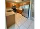 Bright kitchen featuring stainless steel appliances and wood cabinets at 6333 Maisie Rd, Zephyrhills, FL 33542