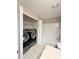 Inside Laundry room featuring side by side washer and dryer, and a shower/tub combo at 6333 Maisie Rd, Zephyrhills, FL 33542