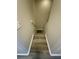 View looking down staircase with modern flooring at 6333 Maisie Rd, Zephyrhills, FL 33542