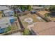 This aerial view shows the back yard is fully fenced for privacy at 6702 49Th N Ave, St Petersburg, FL 33709