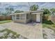 The backyard has a patio with a privacy fence and room for entertaining at 6702 49Th N Ave, St Petersburg, FL 33709