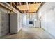 Unfinished basement featuring a washer, dryer and refrigerator at 6702 49Th N Ave, St Petersburg, FL 33709