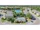 Community pool and clubhouse overlook beautiful pond at 6736 Breezy Palm Dr, Riverview, FL 33578
