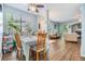 Open concept dining room and living room with lots of light at 6736 Breezy Palm Dr, Riverview, FL 33578