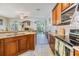 Beautiful kitchen with stainless appliances, stone countertops, and an open floor plan at 6736 Breezy Palm Dr, Riverview, FL 33578