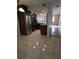 Well-lit kitchen with stainless steel appliances and dark cabinets, offering a modern and functional space at 7168 E Bank Dr # 7168, Tampa, FL 33617