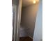 Stairwell with hard wood steps and walls that need paint at 7168 E Bank Dr # 7168, Tampa, FL 33617