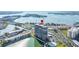High-rise waterfront condo building with private balconies and water views overlooking a pool and boat docks at 7300 Sun Island S Dr # 605, South Pasadena, FL 33707