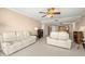 Open-concept living room with tile flooring and comfortable seating at 7300 Sun Island S Dr # 605, South Pasadena, FL 33707