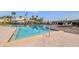 Inviting community pool and spa area with ample lounge chairs for relaxation at 7300 Sun Island S Dr # 605, South Pasadena, FL 33707