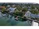 Stunning waterfront homes featuring private docks and lush landscaping with breathtaking views at 761 Bay Esplanade, Clearwater Beach, FL 33767