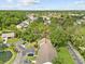Overhead shot of a home surrounded by mature trees in a quiet neighborhood at 7633 Piping Rock Ct # 7633, New Port Richey, FL 34654