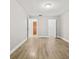 Spacious bedroom with luxury vinyl floors, closet and ensuite bathroom at 7633 Piping Rock Ct # 7633, New Port Richey, FL 34654