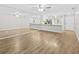 The beautiful vinyl wood flooring flows from the kitchen and continues through the living room at 7633 Piping Rock Ct # 7633, New Port Richey, FL 34654