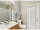 Bathroom featuring a shower and a white vanity at 8124 Brinegar Cir, Tampa, FL 33647