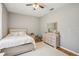 Bedroom with carpet, ceiling fan, and dresser at 8124 Brinegar Cir, Tampa, FL 33647