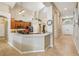A kitchen featuring tile floors, light countertops, and an island at 8124 Brinegar Cir, Tampa, FL 33647