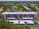 Aerial view of the condo complex, revealing its well-maintained grounds, amenities, parking, and surrounding neighborhood at 8174 Terrace Garden N Dr # 204, St Petersburg, FL 33709
