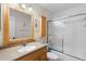 Bathroom featuring a tub and shower combination, vanity, and medicine cabinet at 8174 Terrace Garden N Dr # 204, St Petersburg, FL 33709