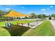 Bocce ball court with shade covering and outdoor seating at 8174 Terrace Garden N Dr # 204, St Petersburg, FL 33709