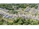 Community view showing ponds, homes and neighborhood layout from an aerial perspective at 8208 Praise Dr, Tampa, FL 33625