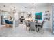 Eat in kitchen area features modern lighting fixtures and seating for four at 8208 Praise Dr, Tampa, FL 33625
