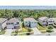 Well-maintained two-story home in a suburban neighborhood with lush green surroundings at 8208 Praise Dr, Tampa, FL 33625