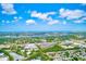 Breathtaking aerial view of the neighborhood, showcasing nearby lake and city views at 8253 118Th Ave, Largo, FL 33773