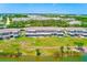 Exterior view of the home featuring covered patios and waterfront views at 8253 118Th Ave, Largo, FL 33773
