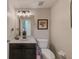 Bathroom features updated vanity with vessel sink, decorative mirror and lighting at 8253 118Th Ave, Largo, FL 33773