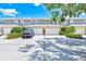 Attractive townhome exteriors with garages and meticulous landscaping, showcasing curb appeal at 8253 118Th Ave, Largo, FL 33773