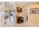 Bright foyer with neutral tile flooring and decorative accents creating a welcoming ambiance at 8253 118Th Ave, Largo, FL 33773
