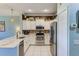Well-equipped kitchen featuring stainless steel appliances and sleek countertops offering efficient cooking space at 8253 118Th Ave, Largo, FL 33773