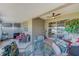 Cozy sunroom with ceiling fan, and beautiful outdoor furniture at 8253 118Th Ave, Largo, FL 33773
