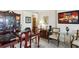 Dining area featuring a wood table, stylish chairs, and elegant decor, creating a warm and inviting atmosphere for dining at 841 4Th N Ave # 55, St Petersburg, FL 33701