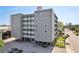 Modern multi-story building with ample parking, neutral color palette, and convenient city location at 841 4Th N Ave # 55, St Petersburg, FL 33701