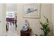 Charming foyer features artwork and decor, with a glimpse into the living and dining areas at 841 4Th N Ave # 55, St Petersburg, FL 33701