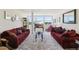 Bright living room featuring hardwood floors, matching sofas, and a view at 841 4Th N Ave # 55, St Petersburg, FL 33701