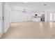 Spacious, bright living room connected to a modern, eat-in kitchen with stainless appliances at 8433 101St Ave, Seminole, FL 33777