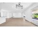 Spacious living room with plank flooring and ample natural light at 8433 101St Ave, Seminole, FL 33777