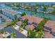 Beautiful waterfront property with well-maintained landscaping, tile roofs, and attached two-car garages at 903 Pinellas Bayway S # 103, Tierra Verde, FL 33715