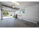 Spacious two car garage provides ample storage and easy access to the home's interior at 903 Pinellas Bayway S # 103, Tierra Verde, FL 33715