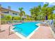 Community pool area features lounge chairs and landscaping to maximize relaxation and enjoyment at 903 Pinellas Bayway S # 103, Tierra Verde, FL 33715