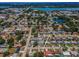 This home features a lush green neighborhood and several nearby bodies of water at 9952 111Th St, Seminole, FL 33772