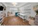 Living room featuring wood floors, large windows and a bright interior at 9952 111Th St, Seminole, FL 33772