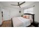 Cozy bedroom boasts natural light, a ceiling fan, and a comfortable atmosphere at 9952 111Th St, Seminole, FL 33772