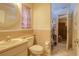 Bathroom featuring tile floors, a vanity with a round mirror, and a shower/tub combo at 3234 Morven Dr, Spring Hill, FL 34609