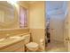 Bathroom featuring tile floors, a vanity with a round mirror, and a shower/tub combo at 3234 Morven Dr, Spring Hill, FL 34609