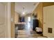This large main bedroom features an outside entry, hard flooring and a ceiling fan at 3234 Morven Dr, Spring Hill, FL 34609